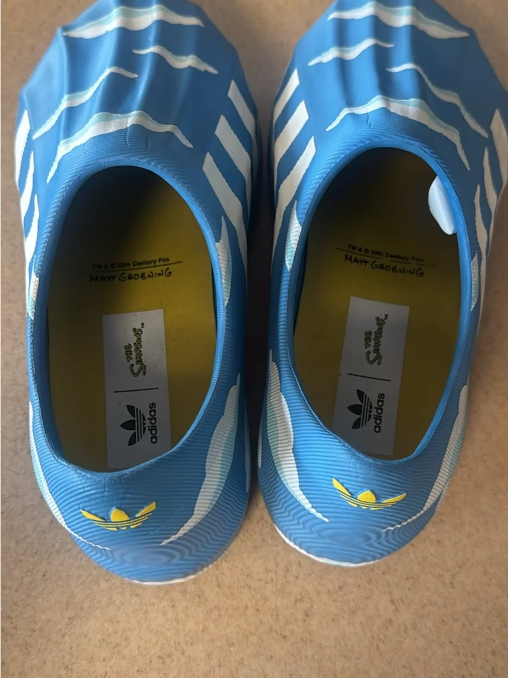 adidas Kids Slip-On Sneakers in Blue with White Cloud Print